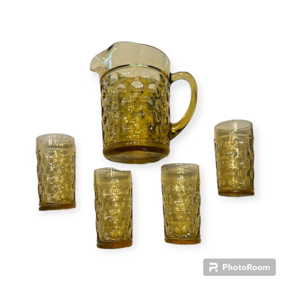 Honeycomb thumbprint pitcher with glasses.